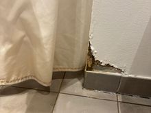 Water/drywall damage in room bathroom