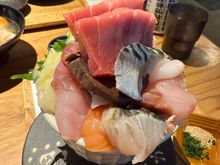 A plentiful bowl of fish donburi with a side of fish head soup (out of shot)