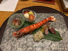 Appetizers inc whole squid, sea cucumber and fish roe 