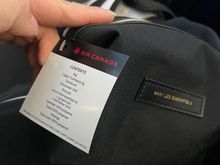 Wants Les Essentiels amenity kit, blanket and pillow + seat cover.

