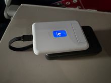 UniFi Travel Router powered by a Anker power bank with built in USB-C cable.