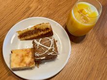 Some dessert and an orange juice 