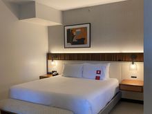 Palm Suite bed. Note: there is no door separating the living room from the bed area, which are roughly in an “L” shape