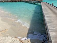 State of erosion beginning of boardwalk towards spa.