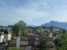The view from the rooms including the fortress and mountains