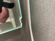Surprised to see a chipped mirror in a brand new room!