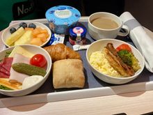 Breakfast before arrival at noon