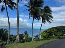 Typical roadside view (Raiatea in the distance in this photo)