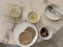 A snack of roast aubergines and some hummus.  