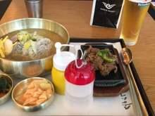 Cold Korean Noodles with a side of marinated beef bulgogi and a pint of Heineken (total circa 15,000 KRW or $15 USD)