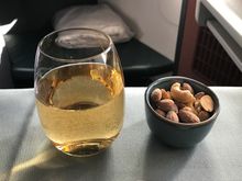 first drink with warm nuts after take off