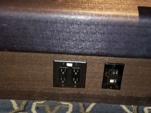 Example of electrical outlets for device charging in lounge seats