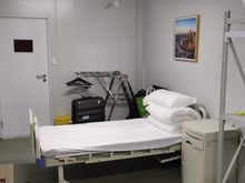 Prefab quarantine facility - room towards door