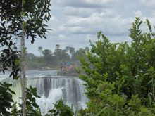 Some tourists that have swum out from the Zambian side oof the river to peer over the edge