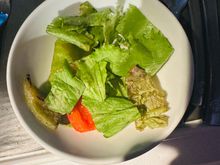 A new low in J.  YYZ - DEL.  'Herb marinated sweet potatoes served with grilled peppers and balsamic vinaigrette'.  
No vinaigrette provided, but that was the least of its problems...