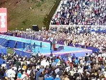 President Obama in an even worse picture than the Springsteen one. The sun had set and it was all manmade light by then.