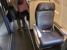 Seat 4A.  Private with plenty of legroom and room to recline.