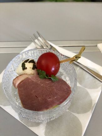 Amuse-bouche consisted of smoked duck, orange and cherry tomato. Tasty. Campari orange that I ordered as an aperitif barely had any orange juice. It was very strong. A flight attendant didn’t know what this cocktail was but I had to tell the recipe. My partner asked for mimosa and the very same flight attendant hadn’t heard about it either.