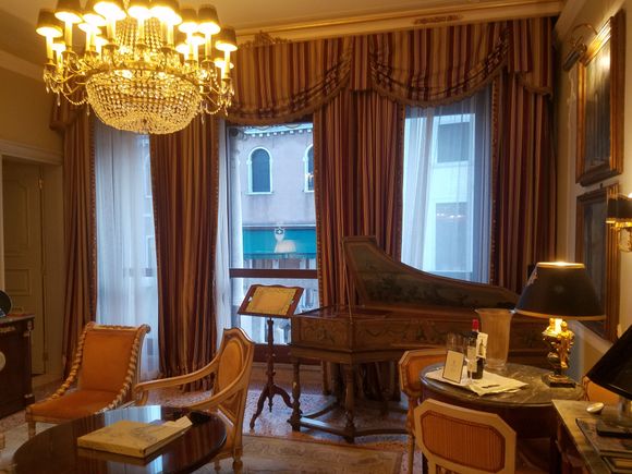 Living room of suite (yes that's a piano)