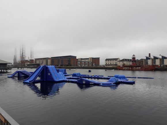 This looks like fun- lots of people were on it the previous afternoon. It is like an inflatable assault course  ( Wild shore dundee) also wakeboarding  is provided but saw no one do the jumps. Wetsuits and lifejackets provided. The 19th Century frigate HMS Unicorn ( unmasted and roofed) is above it . Well worth a visit
