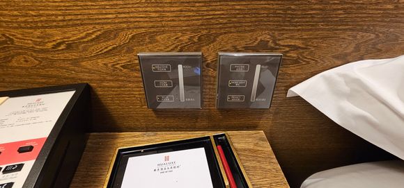 Light switches.
Single plug socket each side of the bed