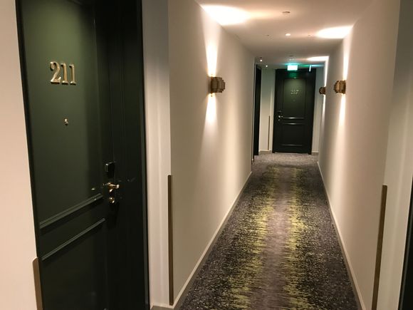 Corridor smelt still fresh of paint, the doors slowly close so you won't hear a bang.