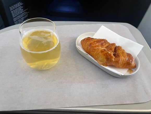 Sparkling wine and croissant