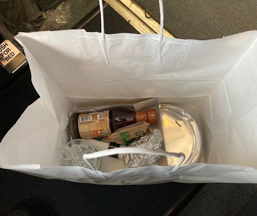 Delivered in a white paper bag, which I love over the plastic bags. 