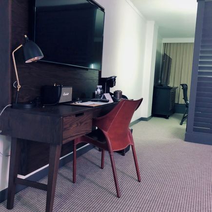 Desk in the room opposite the bed