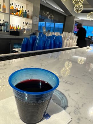 Nothing beats red wine in a blue plastic cup… B6 lounge. No glassware available. 