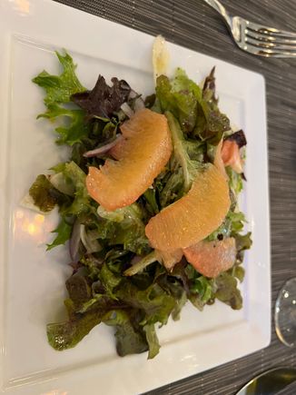 Grapefruit and oak leaf lettuce salad - a bit overdressed but definitely fresh. A big clump of red onion hid underneath, which I avoided. 