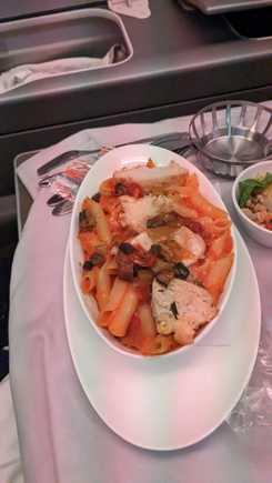 Entree of penne with red sauce and chicken.  Decent taste but a little dry.