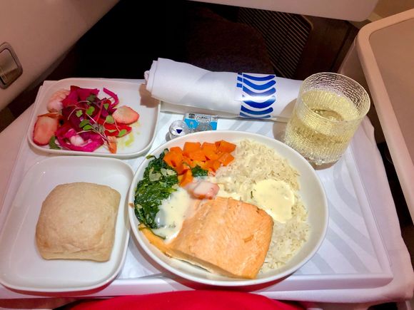 Poached shrimp with pickled vegetables and strawberries for appetizer, poached salmon with lemon-dill cream sauce, sauteed vegetables and jasmine rice for main