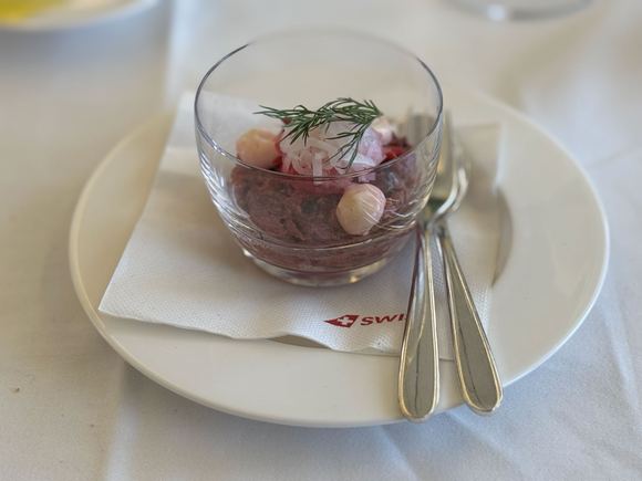 Beetroot tartar with sour cream, wasabi and pickled radish