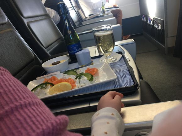ABZ lunch today. Smoked salmon and a raspberry pudding. Note the hand of little miss, fast asleep on my lap! 