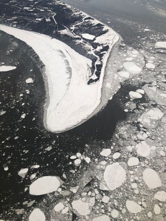 Fire Island and Cook Inlet ice floes on the turn to final for 7R at ANC