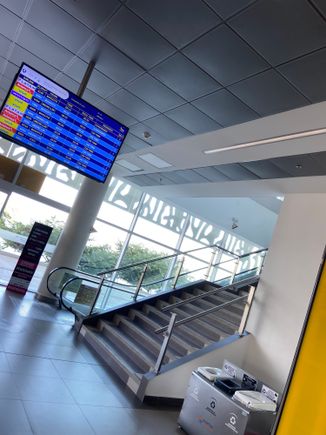 Upstairs to airside. 