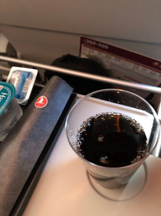 Sipping this cold Pepsi Regular while flying over Mediteranean now
