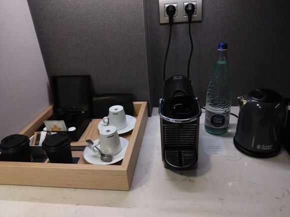 Nespresso machine with cups