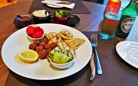 Vegan On request, falafel, bread, and garnments.