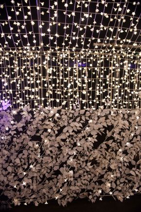 A long tunnel with lights shaped like sakura