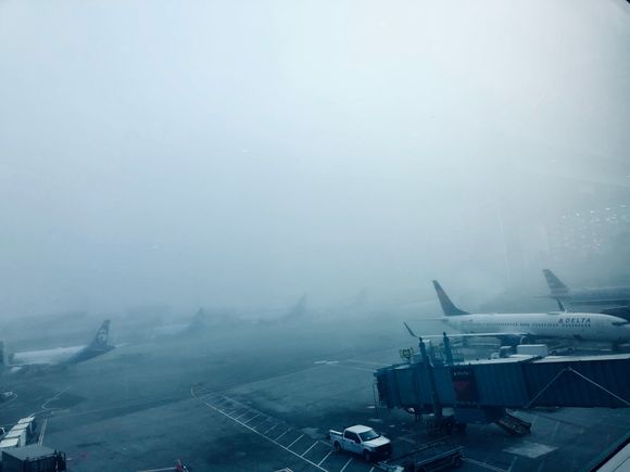 Karl the Fog delaying flights. SFO Sky Club.  