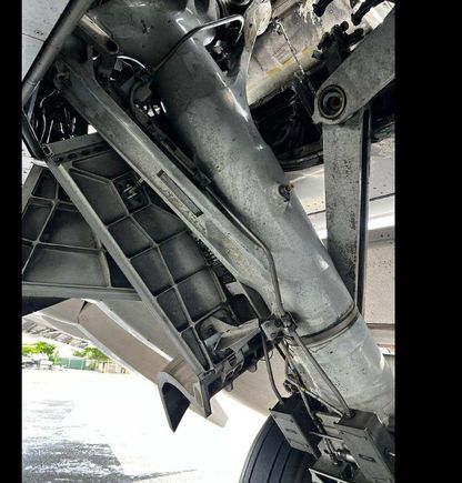 Pilots not checking they had three green for all gear down and locked?
Showed three green but right main lock failed?
Something else?