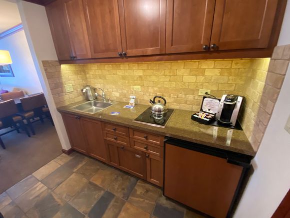 Mini-kitchen area (dishwasher and microwave are hidden behind cabinets) 