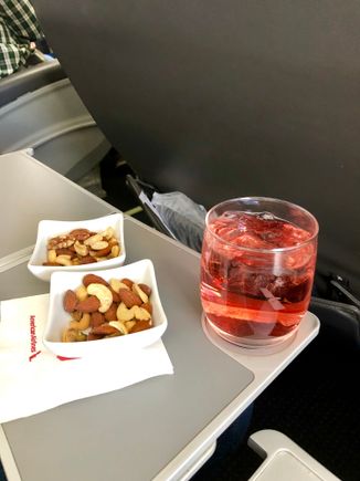 Hot towel.  Nuts.  Beverage service.