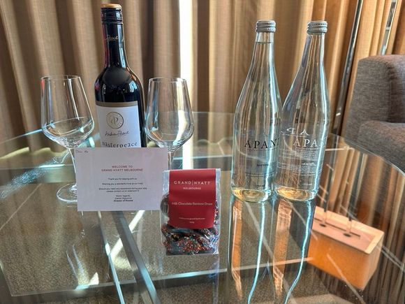 Grand Hyatt Melbourne - wine, still & sparkling water, bag of milk chocolate candy