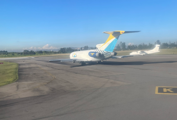 A Boeing 727 taxing ahead of us