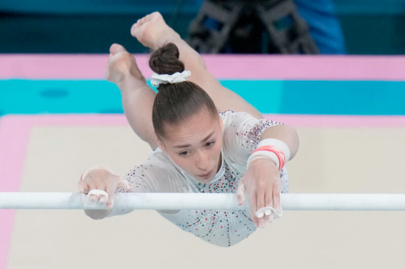 Kaylia Nemour, of Algeria, competes during the women's artistic gymnastics individual uneven bars finals at Bercy Arena at the 2024 Summer Olympics, Sunday, August 4, 2024, in Paris, France. FRANCISCO SECO / AP