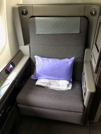 First, the seat. It's the same one that ANA installed on their A380. Although the padding is fairly comfortable, the seat itself is hard and the material isn't that smooth. It was really wide and I could only comfortably use a single armrest at a time.