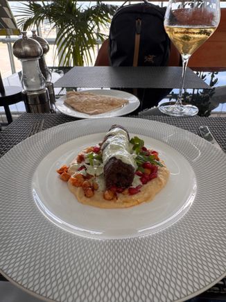 Lamb Kofta and flatbread- The lamb itself was a little dry and overcooked; almost like it had been in the oven a little too long. The accompaniments were really nice though. Not a patch on what you could get in the Middle East but not bad for a BA lounge in LHR. 
